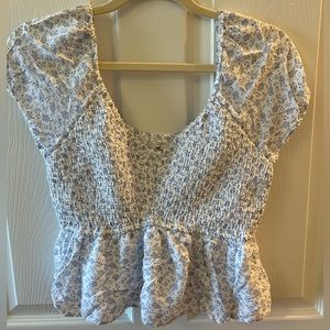 White/ baby blue floral women’s t- shirt blouse from hollister size large.